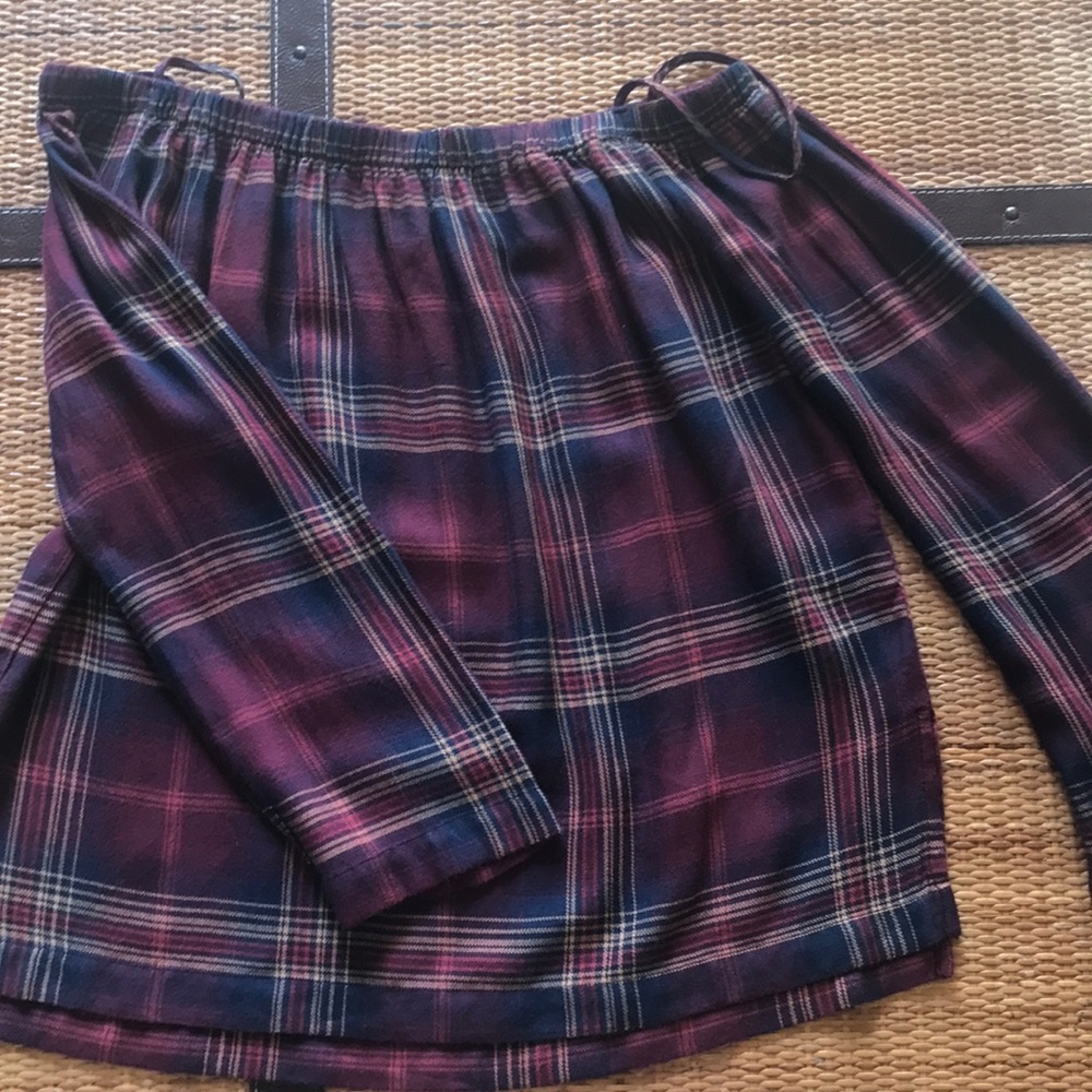 Off the shoulder cotton shirt.